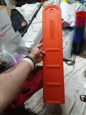 ECHO orange plastic scabbard designed to protect chainsaw blades 24"
